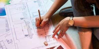 A Houston custom home builder making blueprints