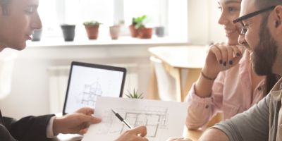 A couple consulting with a Houston custom home builder